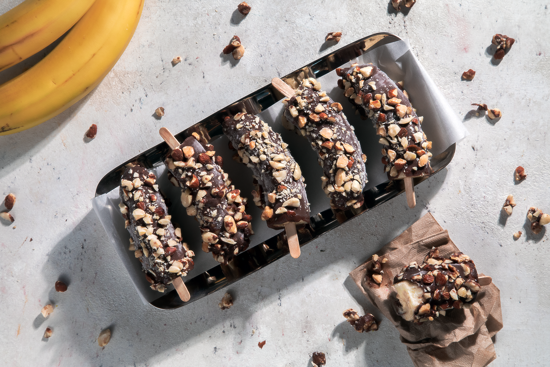 Chocolate Covered Frozen Banana Pops - The BakerMama